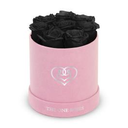 Black roses in a pink round box with a heart logo