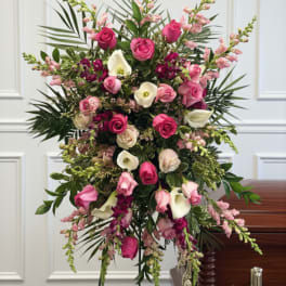 Tall standing floral spray with pink roses and white calla lilies