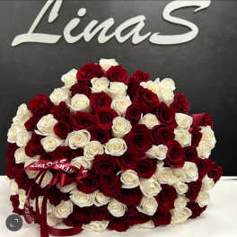 Large bouquet of red and white roses with a ribbon