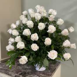 White rose bouquet in a white vase
