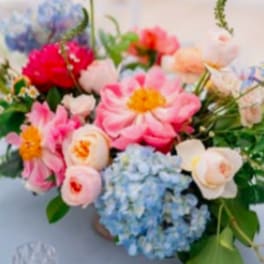 Mixed pastel bouquet with pink, blue, and cream flowers