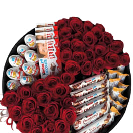 Round box of red roses with Kinder chocolates