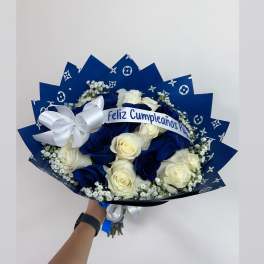 Blue and white rose bouquet with a birthday ribbon and bow