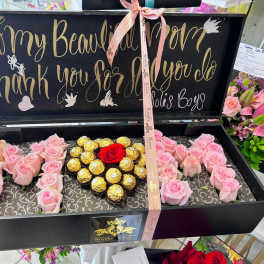 Black gift box with pink roses and Ferrero Rocher chocolates