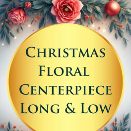 Christmas floral centerpiece sign with pink flowers and ornaments
