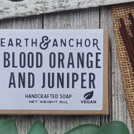 Boxed handcrafted soap labeled Earth & Anchor Blood Orange and Juniper