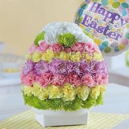 Colorful flower arrangement with a Happy Easter balloon