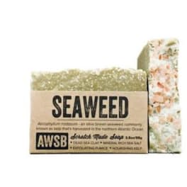 Seaweed-scented handmade bar soap with kraft paper label and exfoliating texture