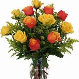 Long Stem Orange and yellow roses arranged in a vase