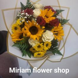 Bouquet of sunflowers, red and white roses, and baby's breath