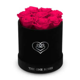 Hot pink roses arranged in a black round box