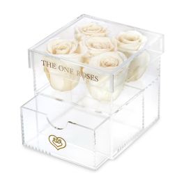 Clear acrylic box with white roses and a drawer below