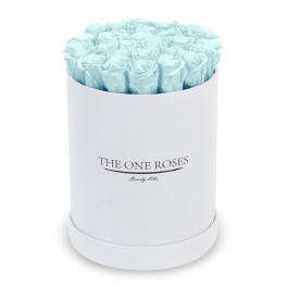 Light blue roses in a white round box
