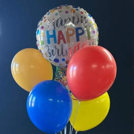 Birthday balloon bouquet with a foil "Happy Birthday" balloon and four latex balloons