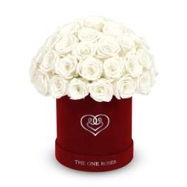 White rose bouquet in a red velvet hat box