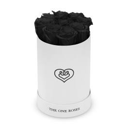 Black roses arranged in a white cylindrical box