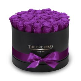 Purple roses in a black round box with a satin ribbon