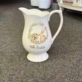 White ceramic pitcher with Easter bunny illustration and "Hello Easter" text