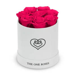 Hot pink roses arranged in a white round box