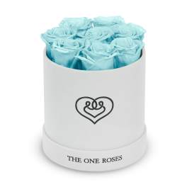 Light blue roses in a white round box with a heart logo