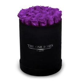 Purple roses in a black round box