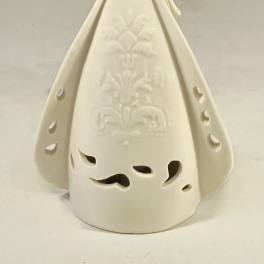 Cream ceramic angel figurine with cutout details and an embossed pattern on the gown.