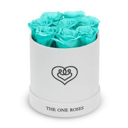 Turquoise roses in a white round box
