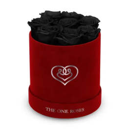 Black roses in a red round box with a heart logo