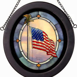 Round stained-glass panel with an American flag and eagle topper in a black frame