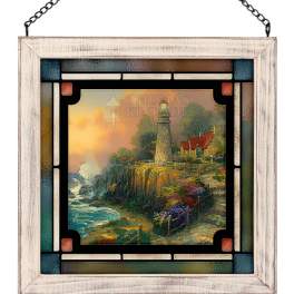 Framed stained-glass-style wall art with a lighthouse scene