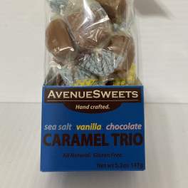 Bag of caramel trio candies tied with a blue ribbon