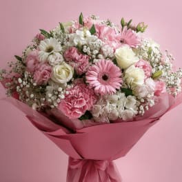Pink and white mixed bouquet wrapped in pink paper