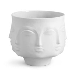 White ceramic planter with sculpted face details