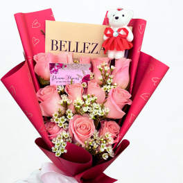 Pink rose bouquet with a teddy bear and ribbon wrap
