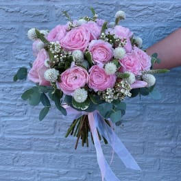Pink rose bouquet with white accents and ribbon