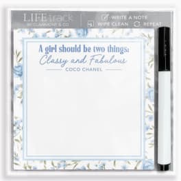 Floral notepad with a pen and a quote at the top
