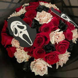 Bouquet of red, white, and black roses with Ghostface toppers
