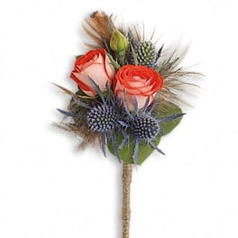 Small boutonniere with coral roses and blue thistle on a wrapped stem