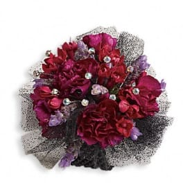 Bouquet of deep pink and purple flowers with black-and-white mesh wrapping