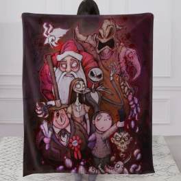 Person holding a dark Halloween-themed blanket with cartoon characters