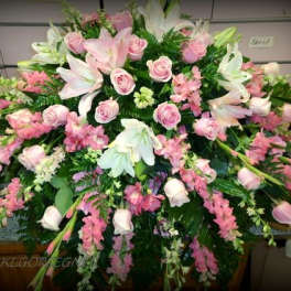 Pink casket spray with white