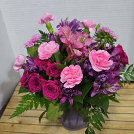 Pink and purple mixed bouquet in a vase