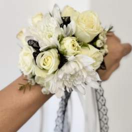 White rose and chrysanthemum bouquet with black lace ribbon