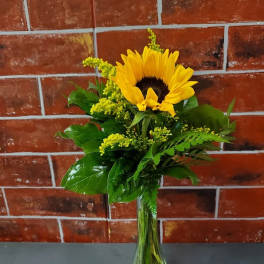 Sunflower bouquet in a clear glass vase