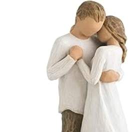 Wooden couple figurine embracing, dressed in white