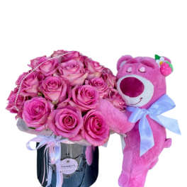 Pink rose bouquet in a black box with a pink teddy bear