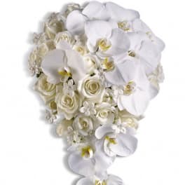 White orchid and rose bouquet with cascading blooms