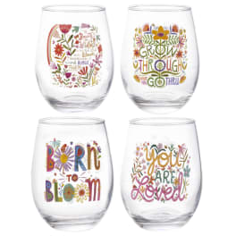 Set of four clear stemless glasses with colorful floral sayings