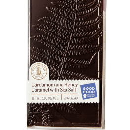 Dark chocolate bar in clear wrapper with a fern design and label