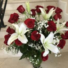 24 Red Roses and White Lilies arranged in a vase